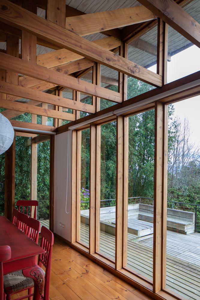 galería de ventanales fijos de madera